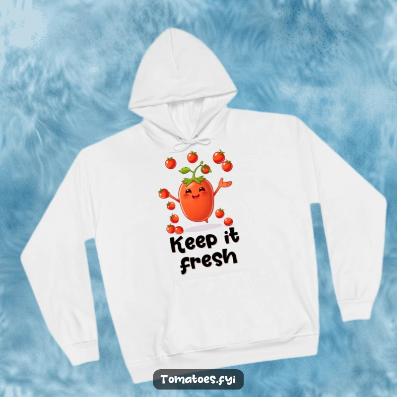Funny hoodie with a happy tomato character juggling small cherry tomatoes, perfect for cozy, fun moments.