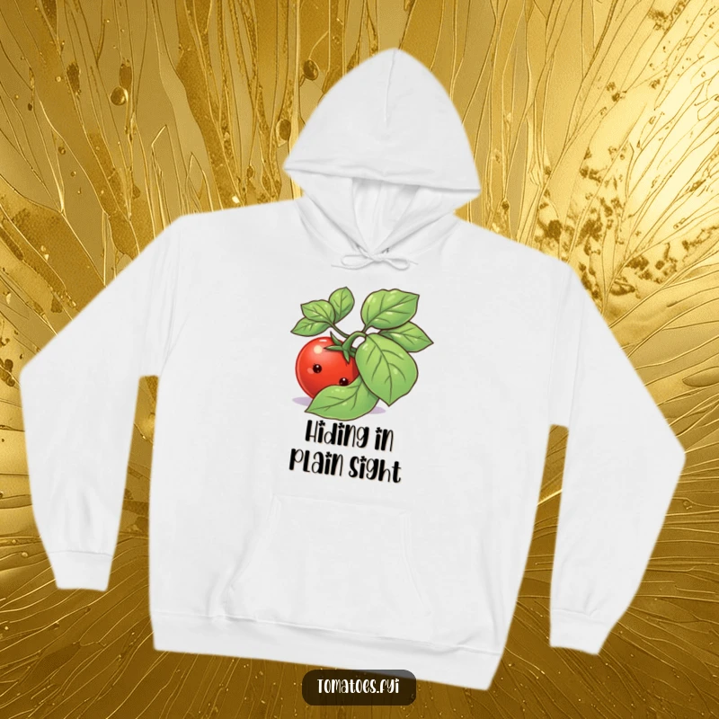 Funny shy tomato character hiding behind a vibrant basil leaf on a warm, comfortable hoodie.