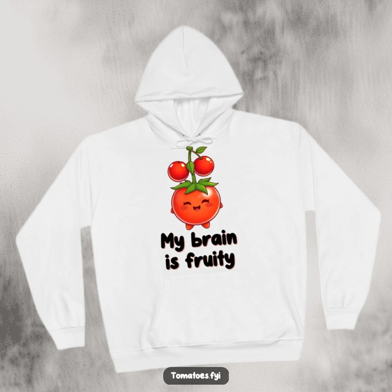 Funny tomato character struggling to put a cherry on its head like a hat, featured on a warm hoodie.