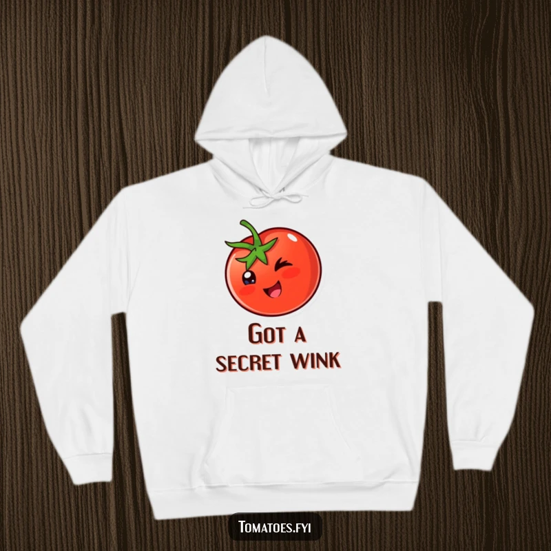 Funny Hoodie: A happy tomato character winks cheekily, bringing a touch of playful charm to your comfort.