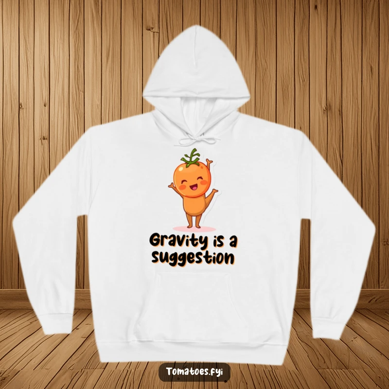 Funny tomato character attempting a challenging handstand with comedic effect on this cozy hoodie.