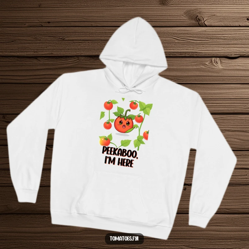 Funny Surprised Tomato Hoodie: A comfortable hoodie featuring a tomato character popping out from a leaf, looking surprised.
