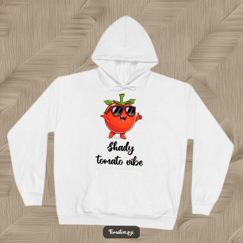 Funny tomato character wearing sunglasses and striking a cool pose, on a warm and funny hoodie.