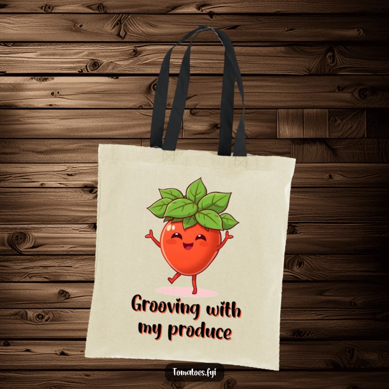 Funny tote bag featuring a vibrant tomato character in a leaf hat, joyfully dancing, perfect for stylishly carrying essentials.